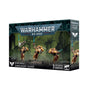 Boxed Blood Angels Sanguinary Guard miniature set, shown from the front and right side. The dark teal box features gold-armored warriors against a green ruined-city scene and reads “WARHAMMER 40,000,” “BLOOD ANGELS SANGUINARY GUARD,” and “3 CITADEL MINIATURES.”