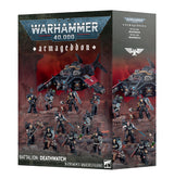Boxed set shown at an angle revealing front and side panels, with the text "WARHAMMER 40,000" and "armageddon" at top and "BATTALION: DEATHWATCH" at the bottom. Box art shows a black and red aircraft hovering over black-armored Space Marine miniatures on a ruined red battlefield.