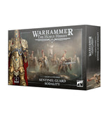 Product box for the Warhammer The Horus Heresy Legio Custodes Sentinel Guard Sodality miniature set, shown at an angle revealing the front and side panels. The front depicts gold-armored warriors with red plumes, shields and swords, a close-up of a gilded figure with a red cape, and a "6 MODELS" badge.