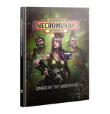 Hardcover rulebook shown at an angle with its spine visible. The cover reads "WARHAMMER NECROMUNDA SKIRMISH" above three illustrated fighters: a purple-haired woman in gold armor holding a gun, a masked man, and a mohawked man, on a glowing green background. Bottom text reads "GANGS OF THE UNDERHIVE".