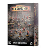 Boxed set for the Warhammer Necromunda tabletop game shown at an angle revealing the front and side panel. The front banner reads "WARHAMMER NECROMUNDA" above artwork of many painted muscular warrior miniatures with weapons on industrial platforms, with "GOLIATH UNDERHIVE CREW" in white at the bottom and a "16 CITADEL MINIATURES" badge.