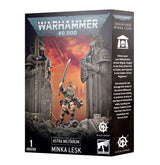 Box for a Warhammer 40,000 Minka Lesk miniature, showing a green-and-tan armored soldier raising a sword over rubble against an orange battlefield, framed by statues. The side panel reads “ASTRA MILITARUM” and “MINKA LESK.”