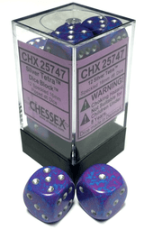 Two rounded-corner d6 dice with purple and bright blue speckles and raised silver pips sit in front of a clear rectangular case with a black base; more matching dice are visible inside. The lavender label reads “CHESSEX” and “Silver Tetra.”