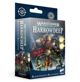 Angled view of a dark blue Warhammer Underworlds expansion box, showing the title “WARHAMMER UNDERWORLDS HARROWDEEP” and “BLACKPOWDER’S BUCCANEERS.” Artwork features a bearded ogre with a weapon and smaller creatures; the narrow side repeats the cover art.