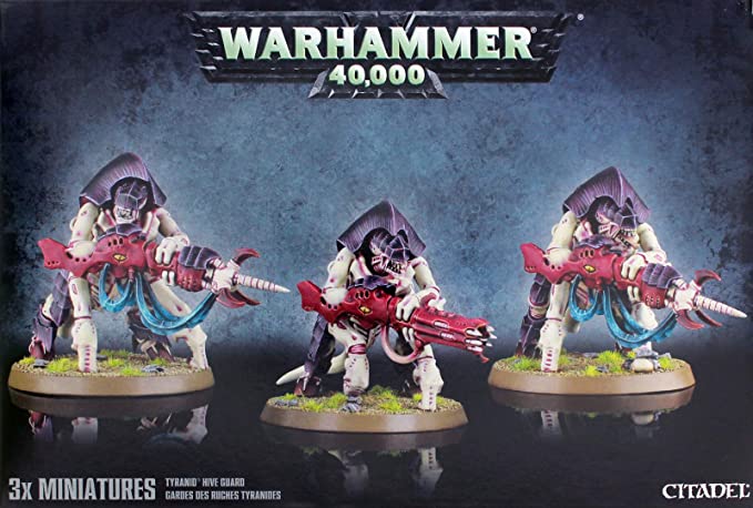 Box front for Tyranids: Hive Guard showing three pale, purple-armored alien miniatures on round bases, each holding a large red weapon with blue tendrils. The package reads “WARHAMMER 40,000,” “3X MINIATURES” and “CITADEL.”