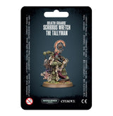 A painted green-armored fantasy miniature stands on a round brown base on a black hanging package card, holding papers with an abacus-like device behind him. The card reads “DEATH GUARD SCRIBBUS WRETCH THE TALLYMAN,” with Warhammer 40,000 and Citadel logos below.