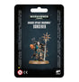 A painted Chaos Space Marines Sorcerer miniature is displayed on a dark backing card, holding a tall staff with a spiked sun emblem and a glowing orange object. The card reads “WARHAMMER 40,000,” “CHAOS SPACE MARINES” and “SORCERER.”