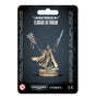 A packaged Eldrad Ulthran miniature stands on a rocky round base, wearing flowing cream-and-black robes with gold markings and raising a staff and sword. The black card reads “CRAFTWORLDS” and “ELDRAD ULTHRAN,” with Warhammer 40,000 and Citadel logos below.