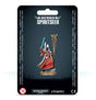 A hooded Aeldari Spiritseer miniature in a flowing red robe, holding a turquoise sword and ornate gold staff, is displayed on a round base against dark packaging. The card reads “CRAFTWORLDS SPIRITSEER,” with “WARHAMMER 40,000” and “CITADEL” logos below.