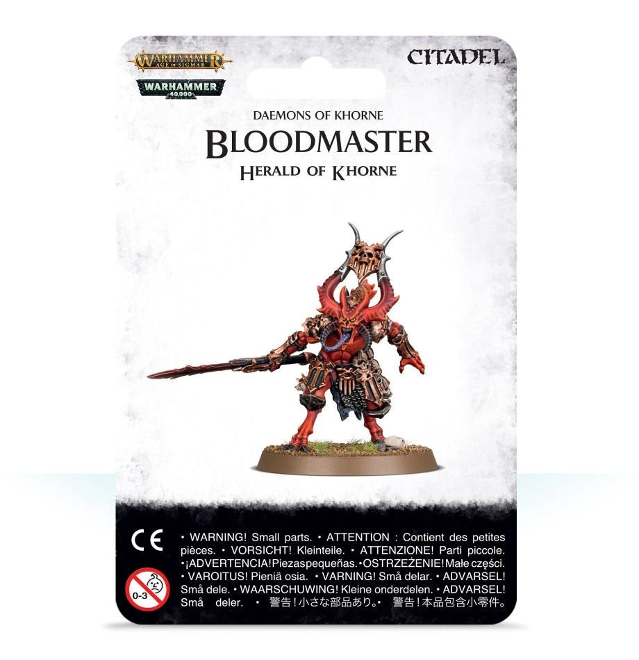 Front of a white-and-black retail card showing a red armored Bloodmaster miniature with horns, a long sword and a round base. The card reads “BLOODMASTER” and “HERALD OF KHORNE,” with “CITADEL” at the top.