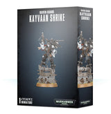 Dark gray Games Workshop box showing a black-armored miniature with white accents, raised weapon and a sculpted stone base on the front and side panels. The front reads “RAVEN GUARD KAYVAAN SHRIKE” and “WARHAMMER 40,000.”