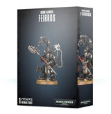 Dark gray Iron Father Feirros miniature box shown from the front and right side, with matching artwork of an armored figure holding a red-handled weapon and mechanical arms above a round base. The front reads “IRON HANDS FEIRROS” and “1 CITADEL MINIATURE.”