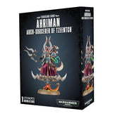 Black miniature-game box showing a horned figure in magenta robes with turquoise and gold details, holding a staff and floating on a bladed disc; the same figure appears on the side panel. Front text reads “AHRIMAN” and “ARCH-SORCERER OF TZEENTCH.”
