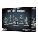 Black game box shown from the front and right side, illustrated with five blue-and-gold armored Scarab Occult Terminator miniatures on round bases. The front reads “THOUSAND SONS” and “SCARAB OCCULT TERMINATORS,” with “WARHAMMER 40,000” branding.