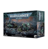 Angled view of a dark green Warhammer miniature box, with front artwork showing soldiers and two field artillery units on rocky ground; the right side repeats the artwork. The box reads “WARHAMMER 40,000,” “ASTRA MILITARUM FIELD ORDNANCE BATTERY,” and “2 MINIATURES.”