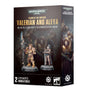 Boxed Valerian and Aleya miniature set, with two figures shown on the front: one in gold armor holding a tall blade and one in pale armor with a sword. The box reads “WARHAMMER 40,000,” “VALERIAN AND ALEYA,” and “2 CITADEL MINIATURES”; character artwork appears on the side.