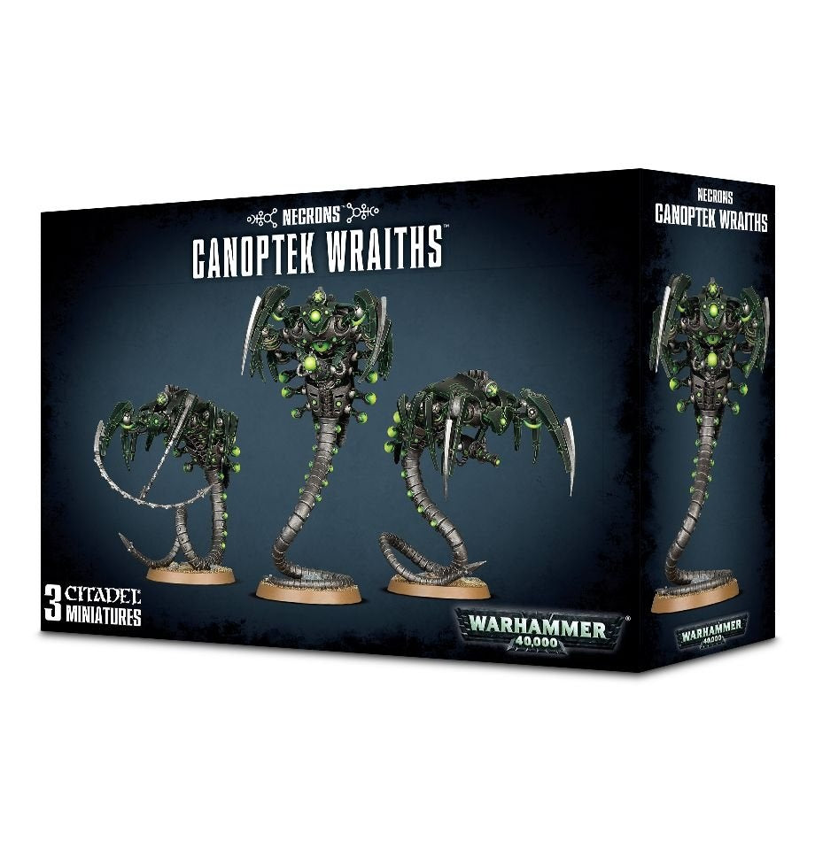 Box for Necrons: Canoptek Wraiths, showing three dark metallic, skeletal serpentine miniatures with bright green details on the front and one on the side panel. The box reads “CANOPTEK WRAITHS,” “3 CITADEL MINIATURES” and “WARHAMMER 40000.”