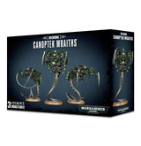 Box for Necrons: Canoptek Wraiths, showing three dark metallic, skeletal serpentine miniatures with bright green details on the front and one on the side panel. The box reads “CANOPTEK WRAITHS,” “3 CITADEL MINIATURES” and “WARHAMMER 40000.”