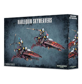 Box for Harlequin Skyweavers showing two masked riders on sleek flying bikes with burgundy and red-orange checkerboard panels, plus a partial repeat of the artwork on the right side. The front reads “HARLEQUIN SKYWEAVERS” and “2 MINIATURES.”