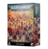Box front and right side showing red, black and gray Chaos Daemons miniatures across a rocky battlefield beneath an orange-yellow sky. The front reads “WARHAMMER 40,000,” “COMBAT PATROL,” “CHAOS DAEMONS” and “34 MINIATURES.”