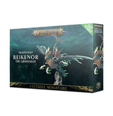 Front and right side of a dark teal Nighthaunt miniature box, illustrated with an armored spectral rider and flowing pale blue-green wisps. The front reads “WARHAMMER AGE OF SIGMAR,” “NIGHTHAUNT REIKENOR THE GRIMHAILER,” and “1 CITADEL MINIATURE.”