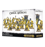 Box for Orruk Ardboys miniatures, shown from the front and right side. The artwork features a group of yellow-armored orruks with weapons and a dark banner; the front reads “ORRUK ARDBOYS” and “15 CITADEL MINIATURES.”