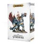 White box for a miniature featuring a blue, armored Stardrake with a rider, spread reddish wings and a rocky base; a second view appears on the side panel. The front reads “WARHAMMER AGE OF SIGMAR” and “STORMCAST ETERNALS STAR DRAKE.”