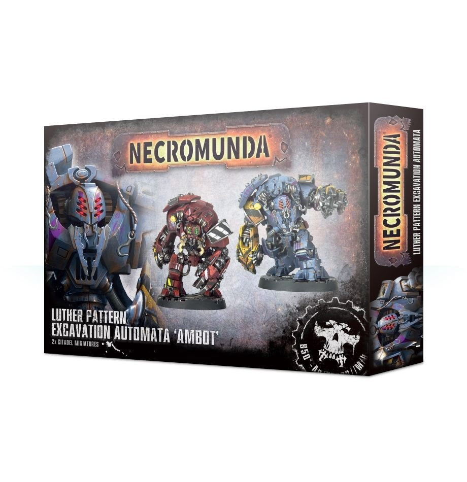 Box for Necromunda excavation automata miniatures, shown from the front and right side. The artwork features two bulky painted robots, one red and one blue; the front reads “NECROMUNDA” and “LUTHER PATTERN EXCAVATION AUTOMATA ‘AMBOT’.”