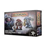 Box for Necromunda excavation automata miniatures, shown from the front and right side. The artwork features two bulky painted robots, one red and one blue; the front reads “NECROMUNDA” and “LUTHER PATTERN EXCAVATION AUTOMATA ‘AMBOT’.”