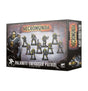 Angled view of a dark, weathered-look Necromunda miniature box showing armored figures in gray and black with yellow accents, carrying weapons. The front reads “NECROMUNDA” and “PALANITE ENFORCER PATROL”; the side repeats the title vertically.