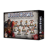 Angled box for Blood Bowl: a gray, blood-spattered front shows armored fantasy football miniatures in red, black and gold, with a larger warrior at left; the narrow black side repeats the title. Text reads “BLOOD BOWL” and “THE DOOM LORDS.”