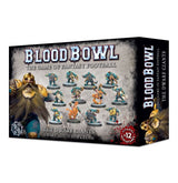 Box for the Blood Bowl Dwarf Giants team, with painted dwarf football miniatures in blue, teal, gold and orange on the front, beside large dwarf character artwork. The box side repeats “BLOOD BOWL” and “THE DWARF GIANTS”; front text includes “×12 MINIATURES”.
