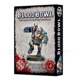 Blood Bowl Ogre miniature box showing a snarling, muscular player in blue armor and numbered gear, posed on a round base. The front reads “BLOOD BOWL,” “THE GAME OF FANTASY FOOTBALL,” and “BLOOD BOWL OGRE.”