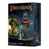 Box for a Middle-Earth miniature set, shown at an angle with its front and right side visible. The front depicts a gray, long-tusked war beast carrying a tiered platform with pink drapes; text reads “THE LORD OF THE RINGS,” “WAR MÛMAK OF HARAD” and “MIDDLE-EARTH.”