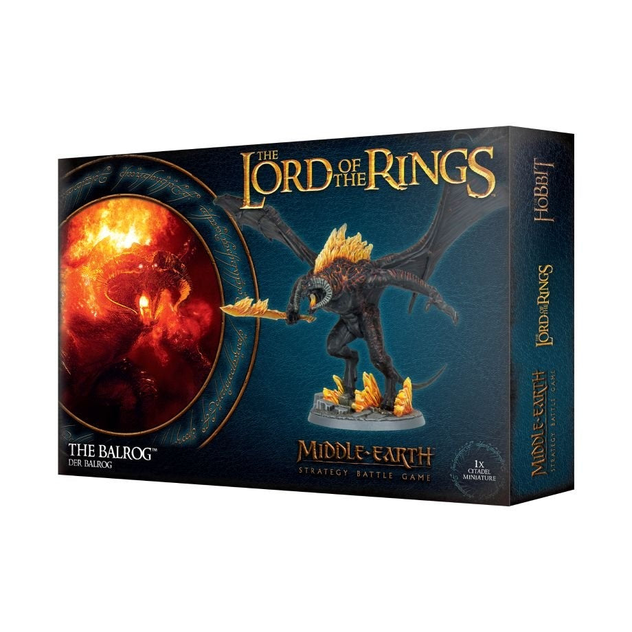 A dark teal Middle-earth game box shown at an angle, with front artwork of a black-winged Balrog with fiery hair and a flaming weapon on a rocky base beside a red fiery scene. The box reads “THE LORD OF THE RINGS,” “THE BALROG,” and “MIDDLE-EARTH.”