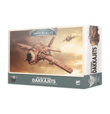 Box for Aeronautica Imperialis Ork Air Waaagh! Dakkajets, shown from the front and right side. The front artwork features a large rusty red aircraft and a smaller plane in a cloudy sky, with “AERONAUTICA IMPERIALIS” and “Dakkajets” on the box.