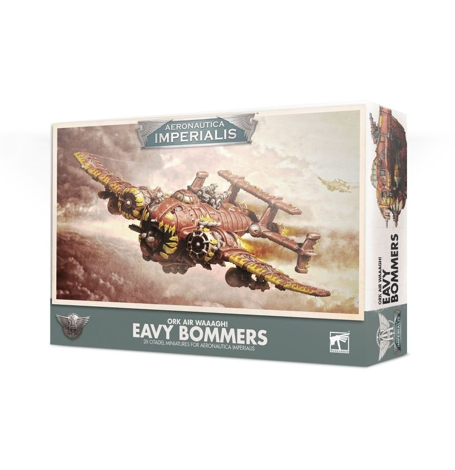 Box for Aeronautica Imperialis Ork Air Waaagh! Eavy Bommers, shown from the front and right side. The front depicts a bulky rust-red aircraft with yellow markings against a cloudy sky and reads “AERONAUTICA IMPERIALIS” and “EAVY BOMMERS.”