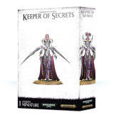White Warhammer miniature box shown from the front and right side, featuring a pale lavender, horned Keeper of Secrets with long blades, purple robes and a round base. The front reads “KEEPER OF SECRETS” and “1 CITADEL MINIATURE.”