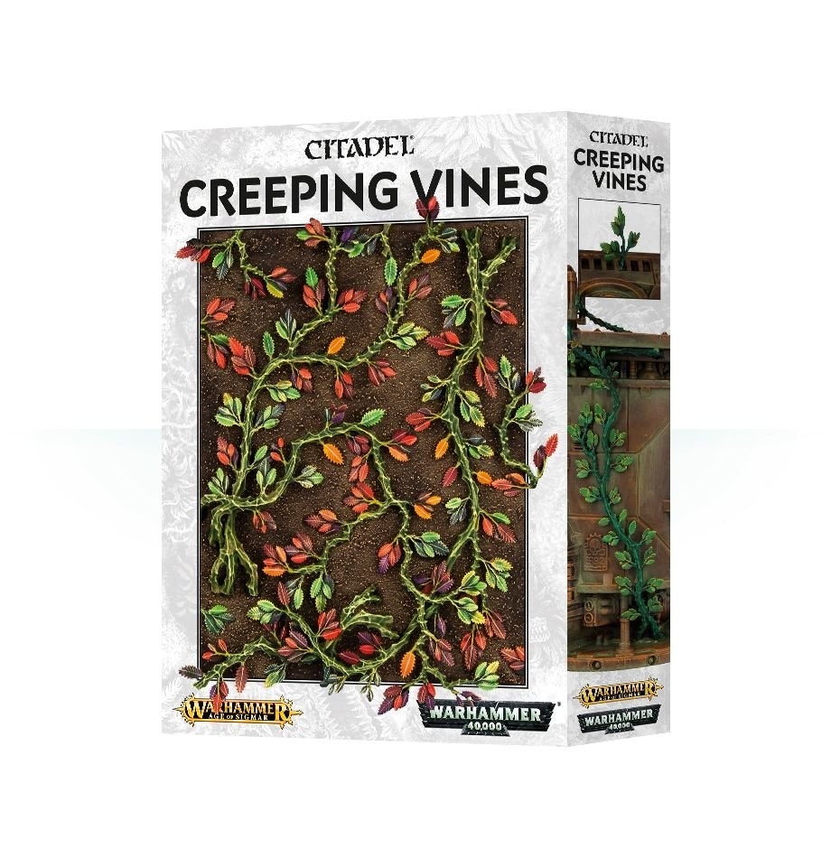 Box of Citadel Creeping Vines, with green winding stems and red, orange, and yellow leaves shown against dark ground on the front; the side shows vines climbing a weathered structure. The box reads “CITADEL” and “CREEPING VINES.”
