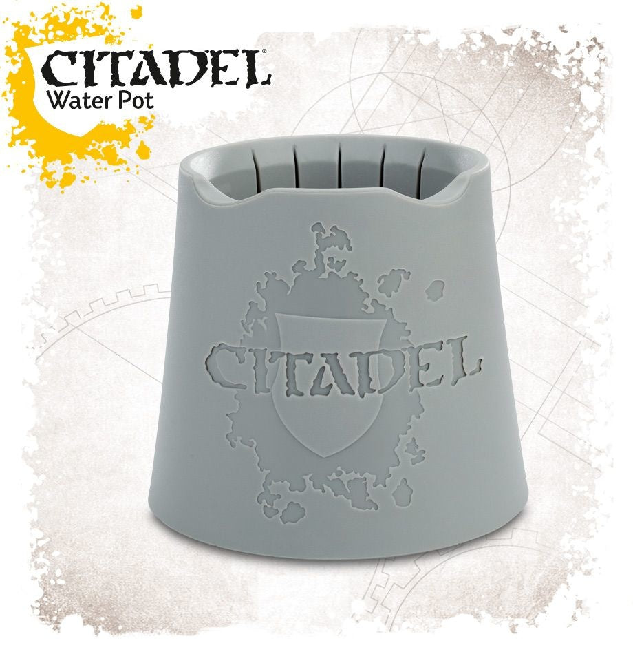 Gray, tapered Citadel water pot shown upright, with a wide base, open top and several grooves around the inner rim. The front has a raised Citadel crest and lettering; the graphic also reads “CITADEL” and “Water Pot.”