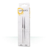 A white and pale gray Citadel file set package with yellow splatter graphics displays two long, slim metal files with pointed, tapered ends. The top bears the logo text “CITADEL,” with “FILE SET” printed near the bottom.