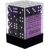 A clear cube-shaped box holds rows of translucent purple six-sided dice with white pips, above a black base. Its purple label reads “CHX 23807,” “Purple with white,” and “CHESSEX.”