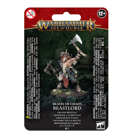 Front of a red-and-black card package showing a painted horned beast warrior miniature with armor, a raised axe and a second weapon. The card reads “WARHAMMER AGE OF SIGMAR” and “BEASTS OF CHAOS BEASTLORD,” with a 12+ age mark.