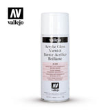 Front-facing white aerosol can with a white cap, black brand bands and a pale pink label. The label reads “Acrylic Gloss Varnish” and “vallejo”; an “AV vallejo” logo appears at the upper left.