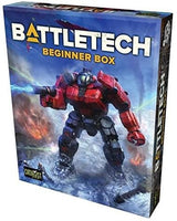 BattleTech: Beginner Box shown at an angle, with a red and dark gray armored BattleMech firing a blue beam against a snowy, smoky battlefield. The box front reads “BATTLETECH” and “BEGINNER BOX,” with a small “CATALYST GAME LABS” logo near the lower left.