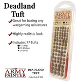 A clear blister pack holds rows of small mottled brown and gray Deadland tufts. The graphic reads “Deadland Tuft” and “The Army Painter,” and states that the pack includes 77 tufts in large, medium, and small sizes.