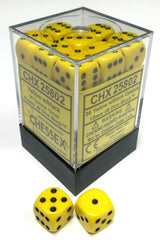 Opaque bright yellow six-sided dice with black pips fill a clear square dispenser, with two loose dice in front showing different faces. The yellow label reads “CHX 25802” and “Yellow w/black.”