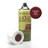 An upright aerosol can of The Army Painter colour primer with a yellow-green label and silver nozzle stands beside its white cap lying on its side. Deep red swatches appear on the label and in a round callout marked “Chaotic Red CP3026”; the can reads “THE ARMY PAINTER.”