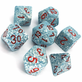 Seven blue-and-white speckled polyhedral dice are arranged loosely on a white background. The dice have assorted shapes and red numerals on their faces.