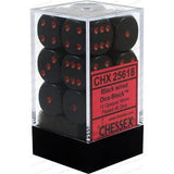 Black six-sided dice with red pips are stacked inside a clear square display box with a black base. A pink front label reads “CHX 25618” and “CHESSEX.”